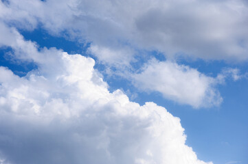 Scenic view of blue sky with white cumulus clouds, natural background