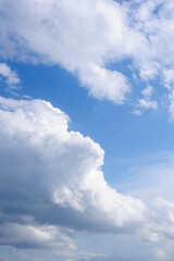 Scenic view of blue sky with white cumulus clouds, natural background
