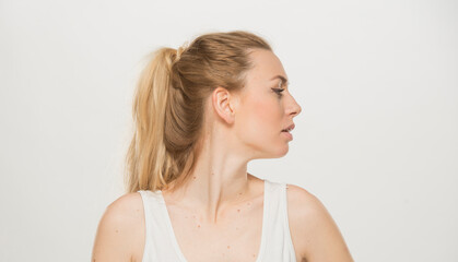 Portrait  of a beautiful young women, dressed white T-shirt , isolated on white.emotional portrait of a young Ukrainian girl