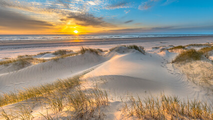 Beach and dunes colorful sunset