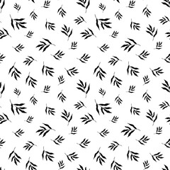 Vector illustration of black leaves of tropical plants forming seamless pattern on white background