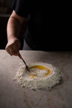 Mixing flour and egg 