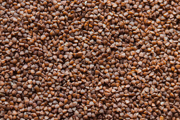 Buckwheat texture background. Natural healty food, vegan diet. High quality photo. Fresh and dry buckwheat