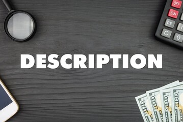 DESCRIPTION - word (text) and money dollars on the table, phone magnifying glass (loupe) and...