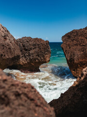 Puerto rico Aguadilla survival beach caves with big rocks formation from the caribbean coast puerto...