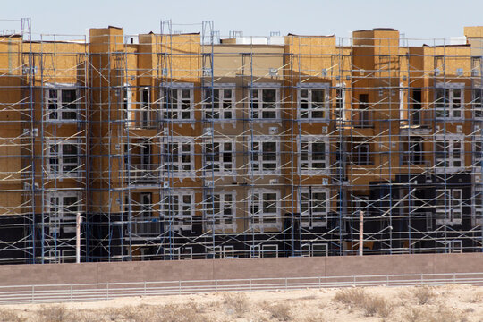 New Construction of Apartments near Las Vegas, Nevada in USA with Scaffolding that is Prepped to Paint