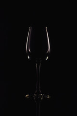 Glaas of red wine on black backgorund
