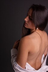 SEMI-NUDE PHOTOGRAPH OF A MODEL WITH A WHITE SHIRT ON A DARK BACKGROUND - ARTISTIC NUDE PHOTO SESSION