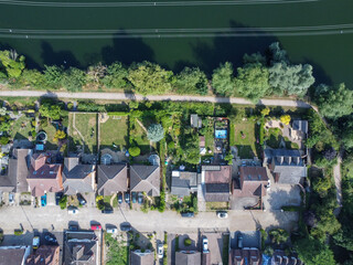 Downward drone shot of riverside housing in Hertfordshire