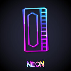 Glowing neon line Harmonica icon isolated on black background. Musical instrument. Vector