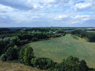 Fototapeta na wymiar Aerial view of farming fields and woodland in Hertfordshire UK