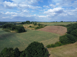 Fototapeta na wymiar Aerial view of farming fields and woodland in Hertfordshire
