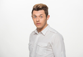 close-up portrait of a man in a white shirt on a white background isolated.portrait of a man with different emotions isolated.