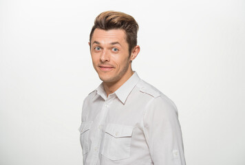 close-up portrait of a man in a white shirt on a white background isolated.portrait of a man with different emotions isolated.