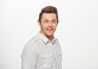 close-up portrait of a man in a white shirt on a white background isolated.portrait of a man with different emotions isolated.