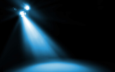 Bright spotlight in darkness. Professional stage equipment