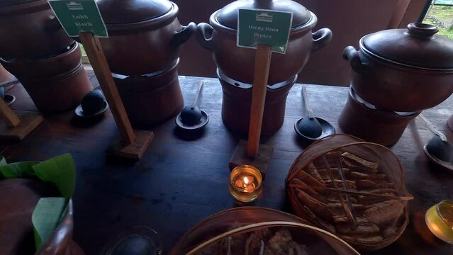 Traditional java food buffet served in clay ceramics bowl