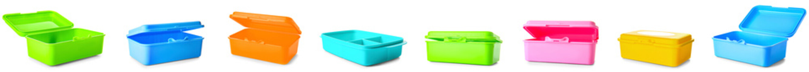 Set of plastic lunch boxes on white background