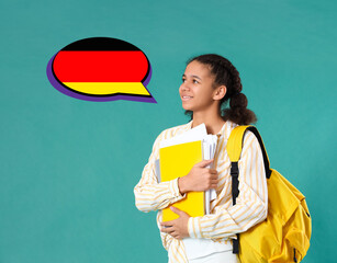 African-American female student on green background. Concept of studying German