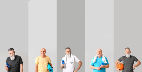 Set of sporty elderly men on grey background