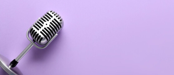 Fototapeta na wymiar Retro microphone on lilac background with space for text