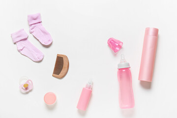 Different accessories for baby girl on white background