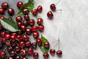 Tasty ripe cherries on light background