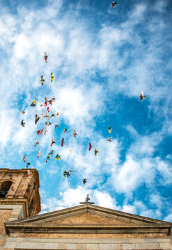 Messanger Doves Flying Over The Clouds