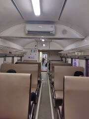 Indonesia railroad passanger trains in the economy class service. Bandung, Indonesia - July 14, 2022