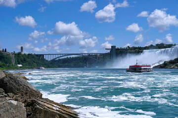 View of the Niagara River below Niagara Falls looking toward the American Falls and Raiinbow Bridge