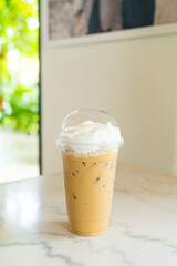 iced cappuccino coffee glass on table