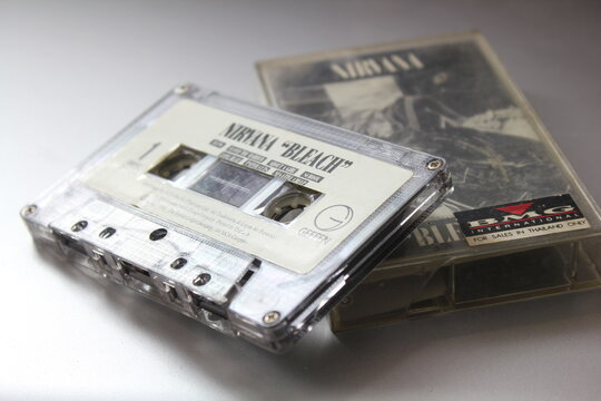 Bangkok, Thailand - 09 February 2022 : 90's cassette tape of Nirvana Bleach album on gray background.