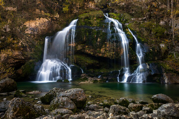 Idyllic Alpine Waterfall of Virje on River Gljun near town Bovec in Julian Alps Slovenia