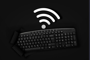 PC keyboard with wifi sign on black background
