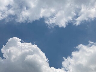 Obraz premium White clouds in the blue sky.Winter cold clouds blue heaven background.