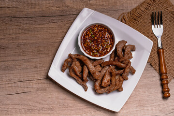 Sun-dried pork in a white plate