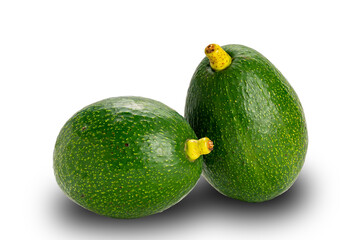 Green fresh avocado on white background with clipping path. Avocado has a buttery flesh when ripe.