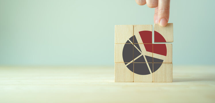 Increase market share, growth of business profit concept. Market penetration and expansion strategies. Wooden cubes showing a market share percentage using a pie chart. Strengthen business strategies.
