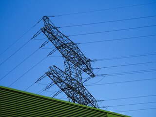 Electric hub on pole, power line with blue sky