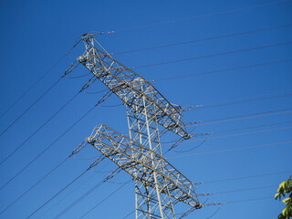 Electric hub on pole, power line with blue sky