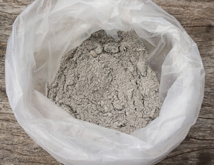 The ashes in plastic bags are used as fertilizer for plants planted in agricultural gardens.