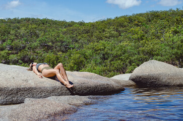 Girl Woman on a waterfall Far North Queensland Davies Creek fairyfalls falls real woman rocks summer sun bathing