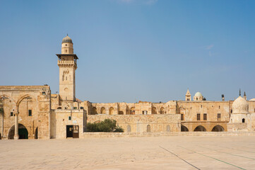 Fototapeta premium The view at the top of Temple Mount also known as Haram al-Sharif, Al-Fakhariyya Minaret of Al-Aqsa Mosque, in front of area of Dome of the Rock . Old city, Jerusalem, Israel. 