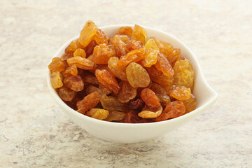 Sweet yellow raisin in the bowl