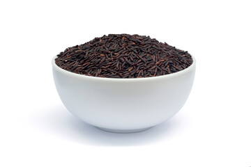 Raw Thai Riceberry in white bowl isolated on white background included clipping path.