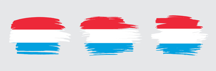 Set of 3 creative brush flag of Luxembourg with grungy stroke effect. Modern brush flags collection.