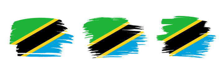 Set of 3 creative brush flag of Tanzania with grungy stroke effect. Modern brush flags collection.
