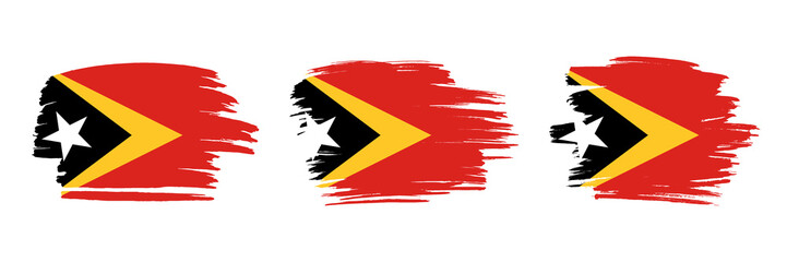 Set of 3 creative brush flag of Timor Leste with grungy stroke effect. Modern brush flags collection.