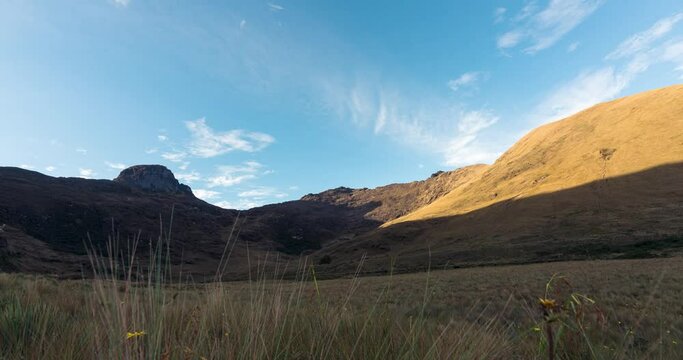 Landscape timelapse of Andes Mountains in Peru. Time lapse with the sun lighting up the mountains and clouds clouds moving