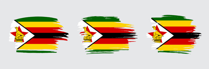 Set of 3 creative brush flag of Zimbabwe with grungy stroke effect. Modern brush flags collection. - obrazy, fototapety, plakaty